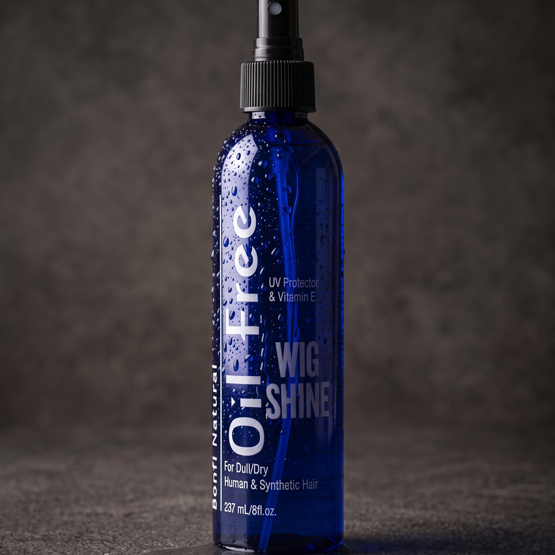 Bonfi Natural Oil-Free Wig Shine Spray 8 oz on a bathroom vanity