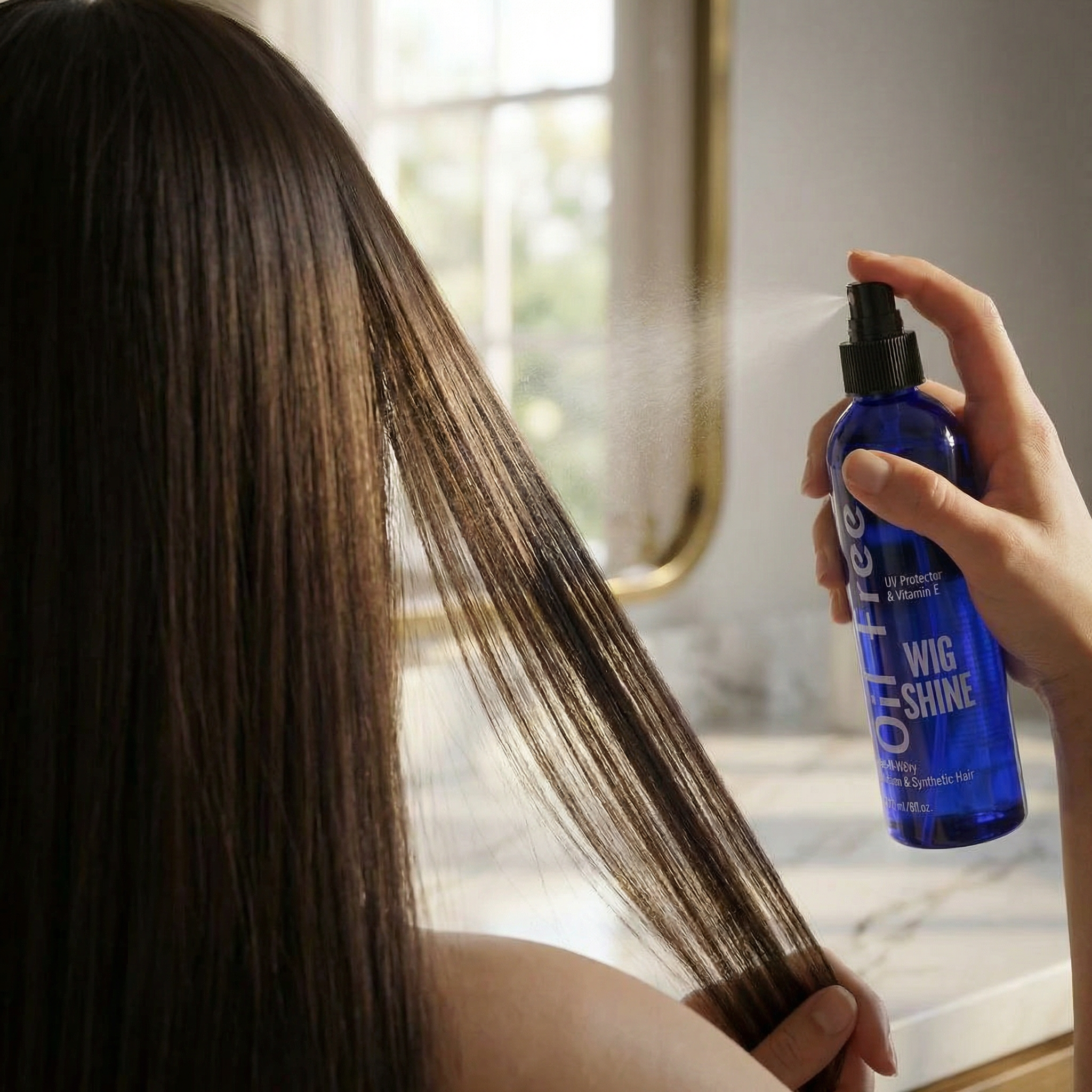 over_the_shoulder_shot_of_person_applying_hair_product_focus_on_long_smooth_hair_strands_wet-n-wavy_ci41i9xvlctk5amnae6q.png